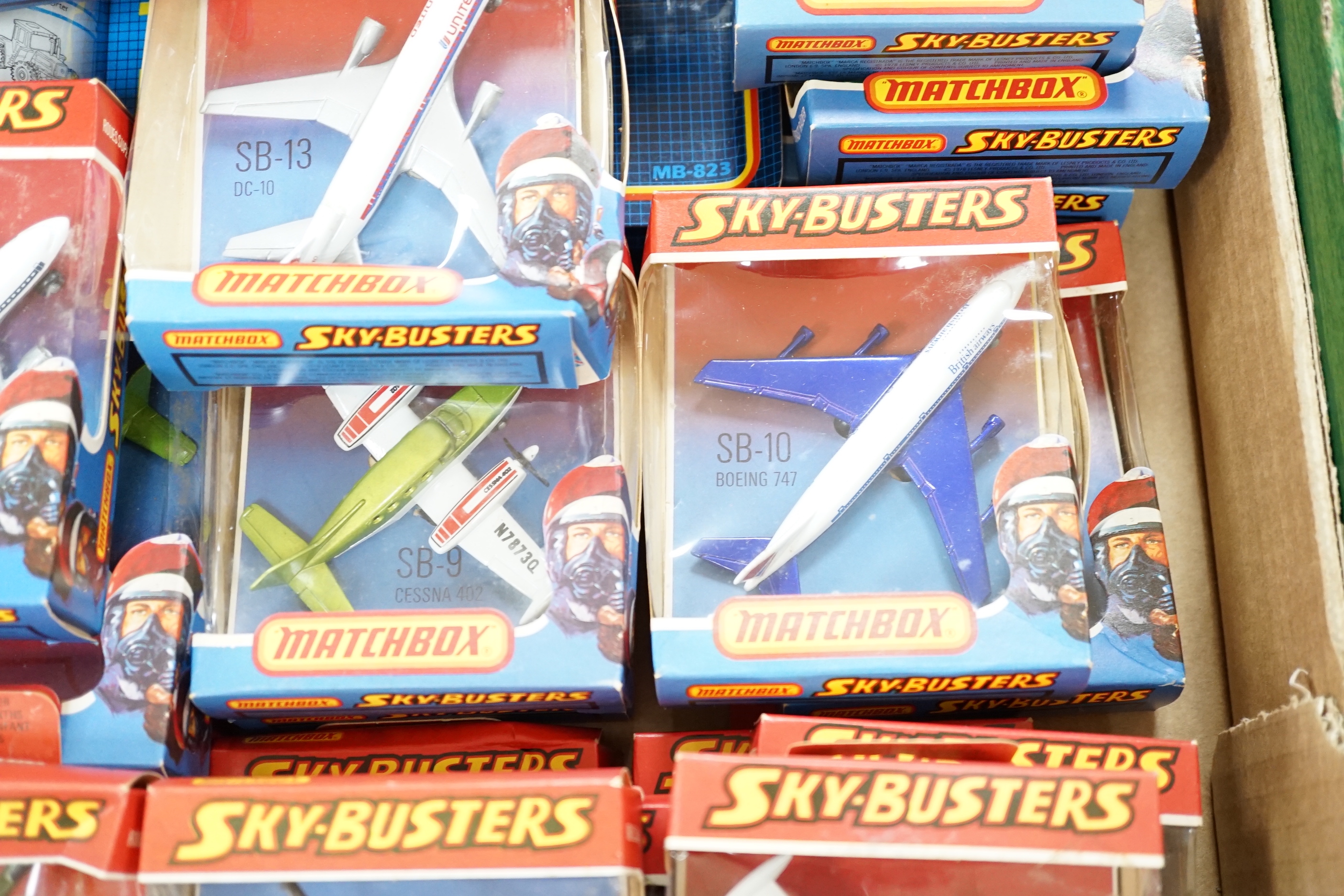 Thirty one boxed 1970s Matchbox Sky Busters diecast aircraft, together with two 1980s Matchbox ‘Super Value Packs’ of diecast vehicles